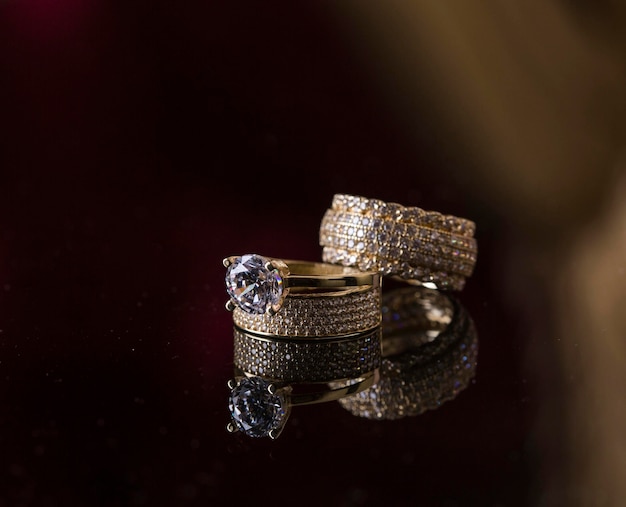 Close-up of wedding rings on glass