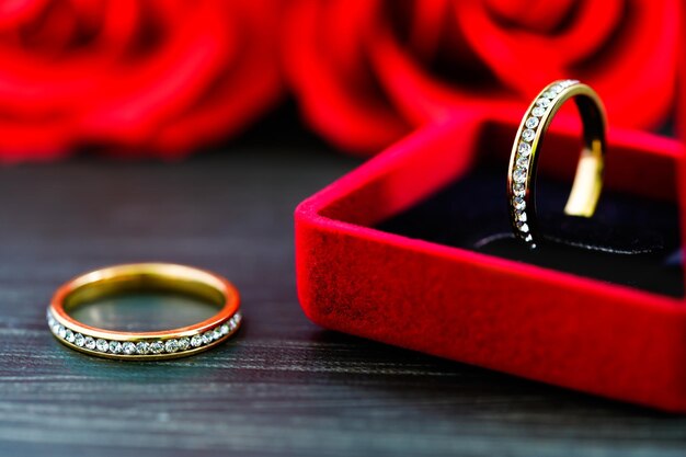 Close-up of wedding rings on table