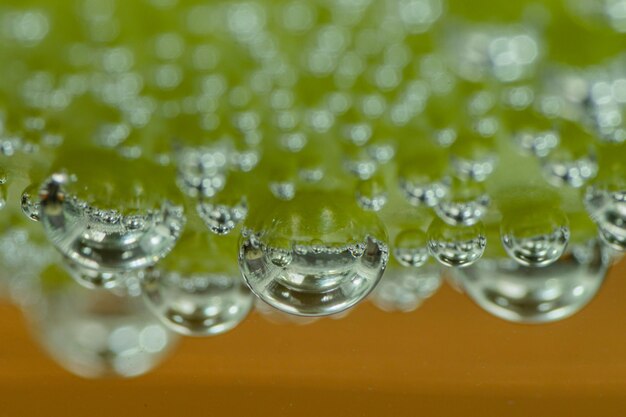 Photo close-up of wet drinking glass