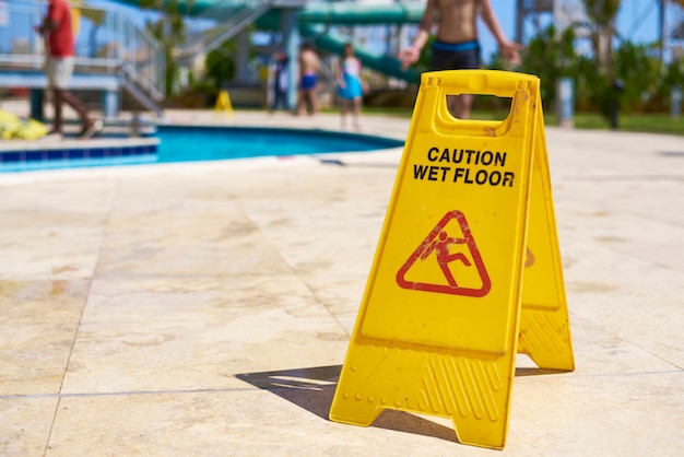 Close up of wet floor caution sign