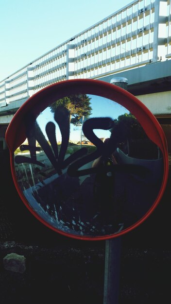 Photo close-up of wheel against the sky