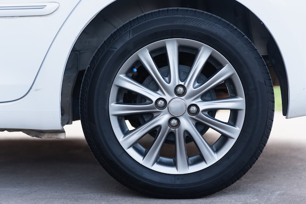 Close up wheels white car, transportation concept