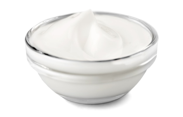 close up of a white beauty cream or yogurt on white background with clipping path