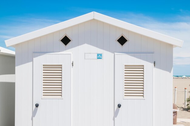 Close-up of white building against sky