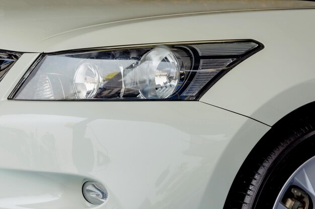 Close-up of white car in store