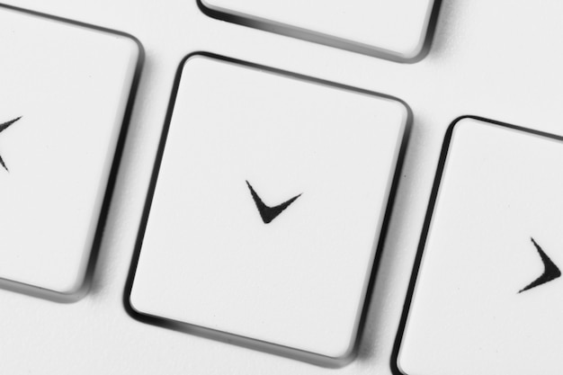 Photo close up of a white computer keyboard