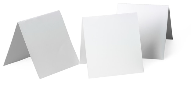 Close up of a white note paper on white background