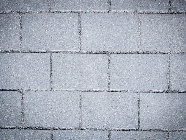 Close up white paving slabs with seams