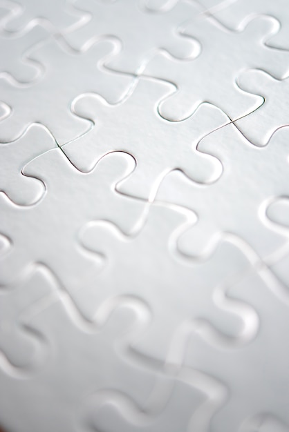 Close-up of white puzzle completed