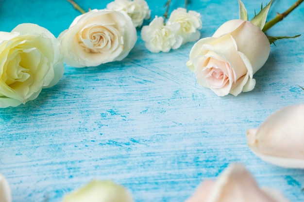 Close-up of white roses on table