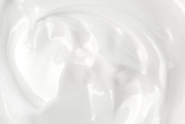 Close up of a white whipped or sour cream background