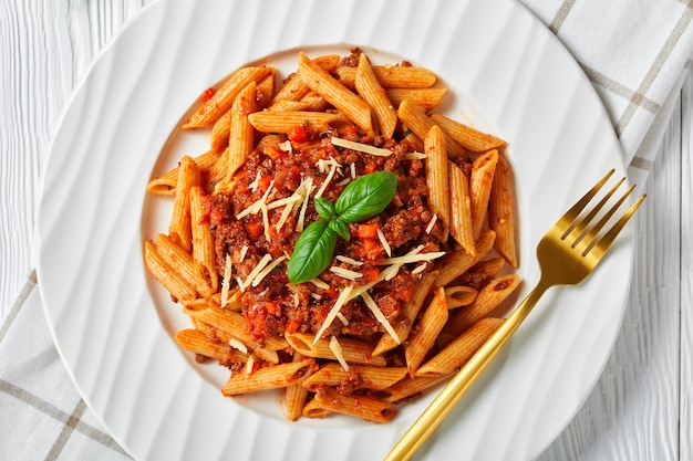 Close-up of whole wheat penne bolognese