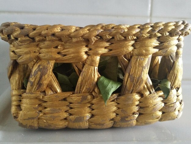 Close-up of wicker basket on table