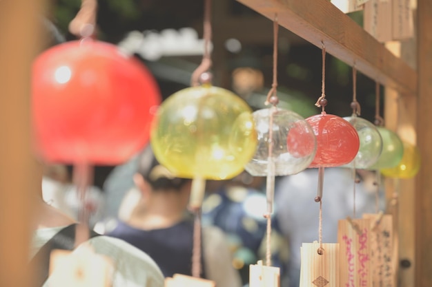 Close-up of wind chime for sale in market