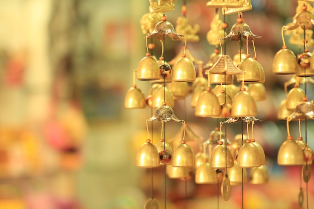 Close-up of windchime hanging for sale