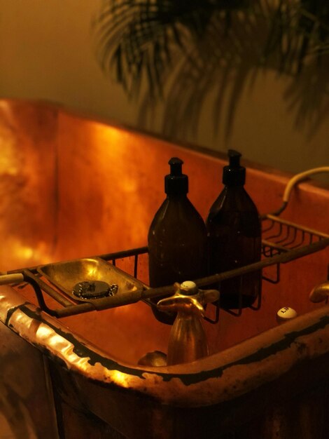 Close-up of wine bottles on table