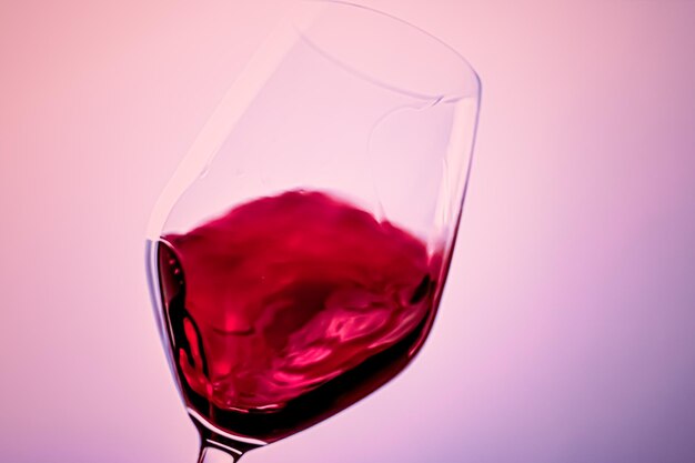 Close-up of wine glass against white background