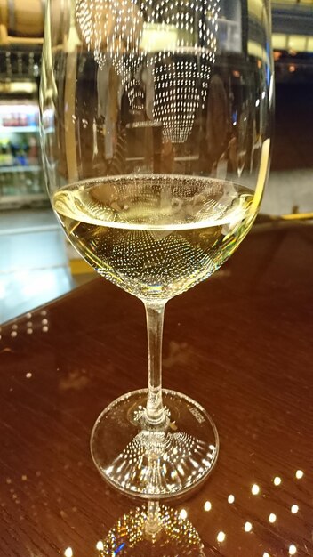 Close-up of wine glass on table