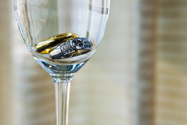 Close-up of wine in glass on table