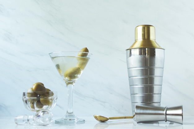 Close-up of wine glasses on table against white background