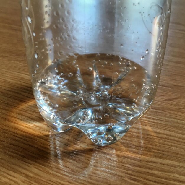 Close-up of wine glasses on table