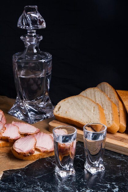 Close-up of wine glasses on table