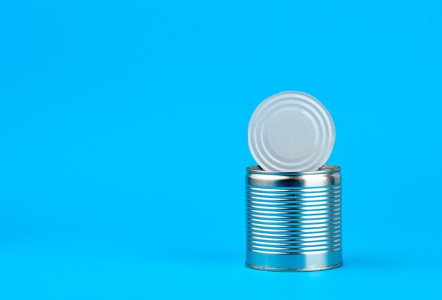 Close-up of wineglass against blue background