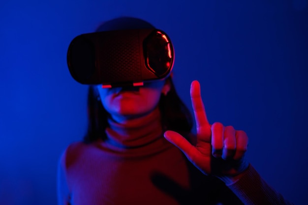 Close-up of woman against blue background