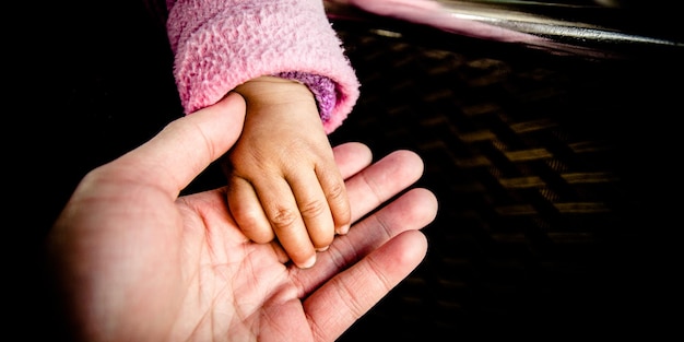 Photo close-up of woman and baby at home