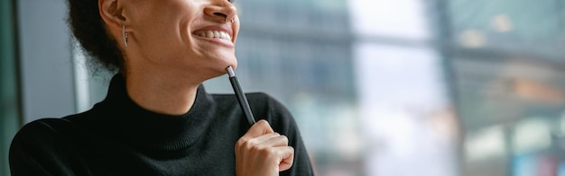 Close up of woman drinking coffee during break working in cafe distance work concept