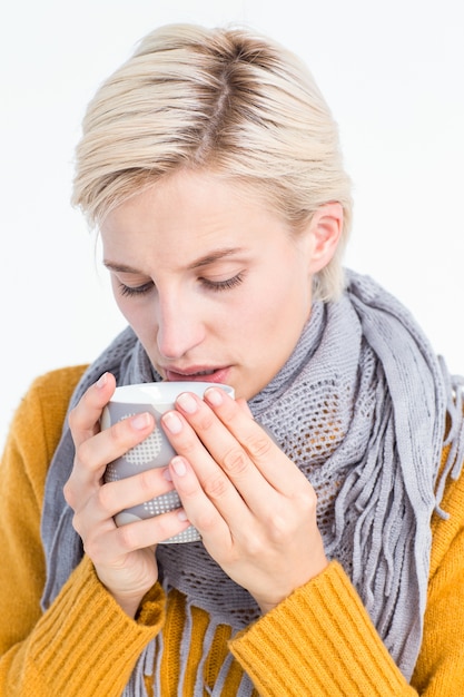 Close up of woman drinking from a cup