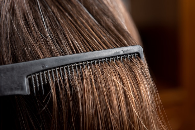 Photo close up woman at hair salon