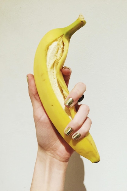 close-up of woman hand holding fruit