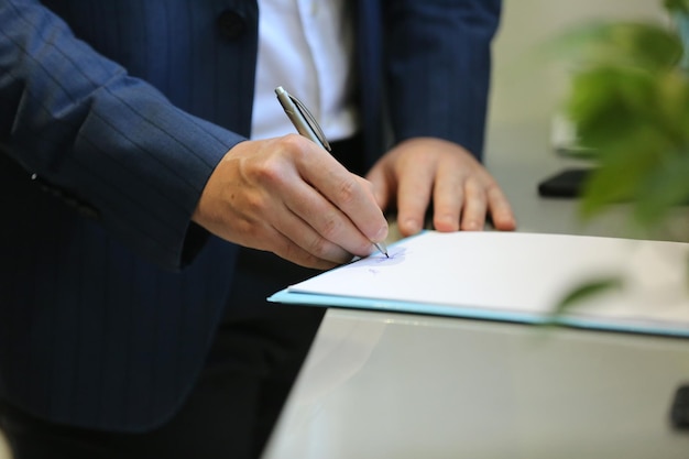 Close-up of woman hand holding paper