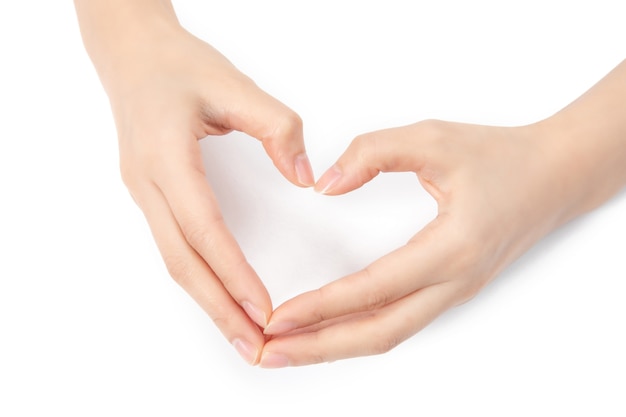 Close up of a woman hands making heart