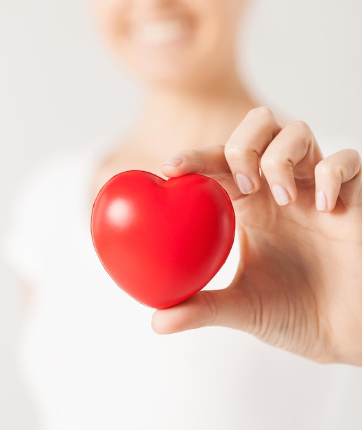 close up of woman hands with heart