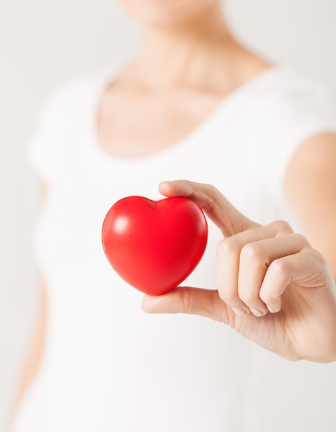 close up of woman hands with heart