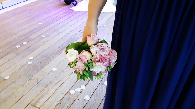 Close-up of woman holding bouquet