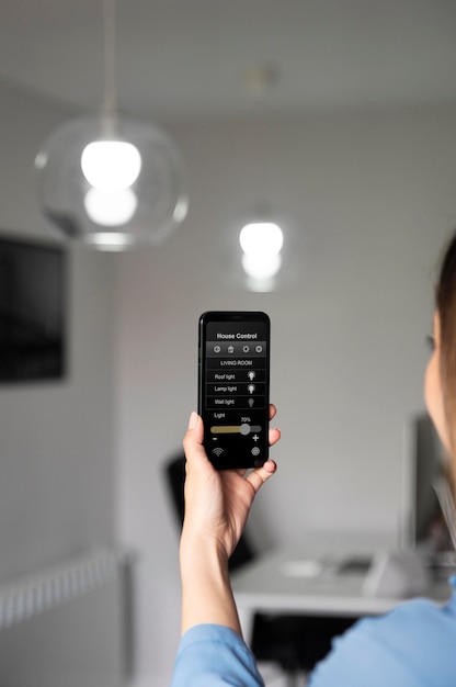 Close up woman holding smartphone