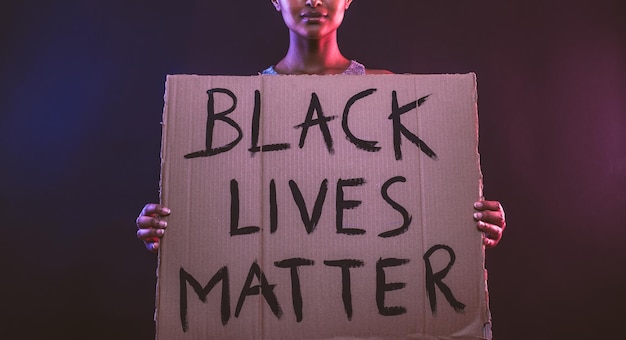 Photo close-up of woman holding text