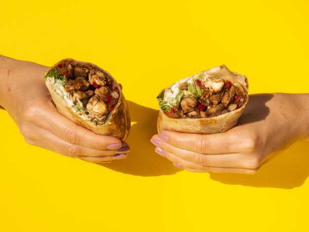 close up woman holding traditional mexican food High quality and resolution beautiful photo concept