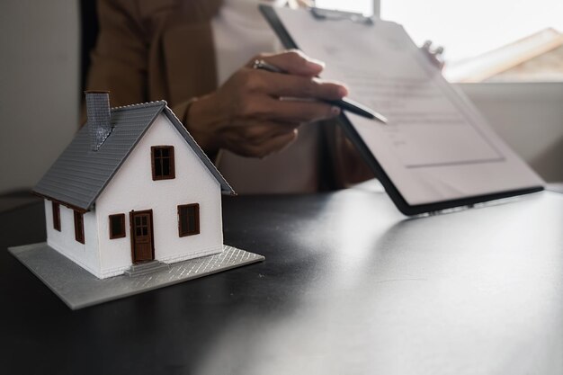 Close-up of woman holding umbrella in house