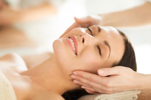 close up of woman in spa salon getting face treatment