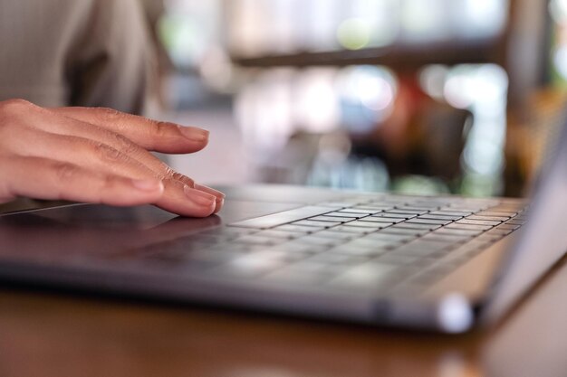 Close-up of woman using mobile phone