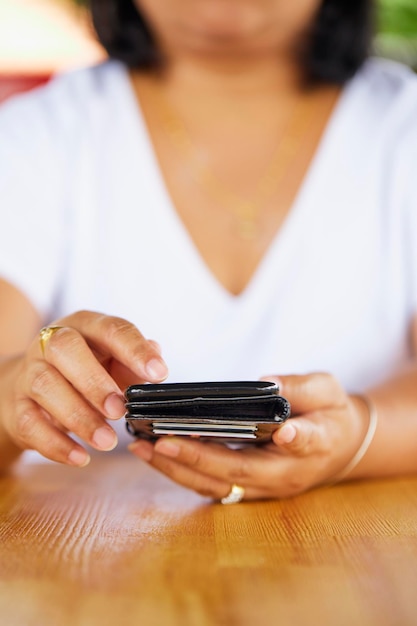 Close-up of woman using smart phone