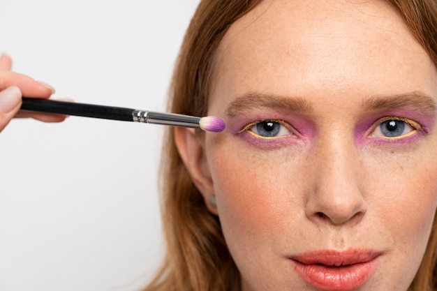 Close up woman wearing eyeshadow