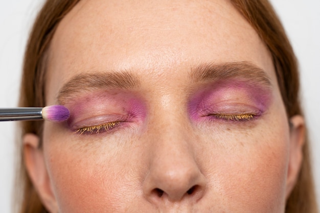 Close up woman wearing eyeshadow