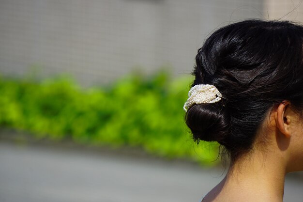 Photo close-up of woman with hair bun