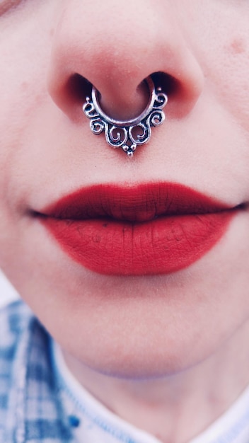 Close-up of woman with red lipstick