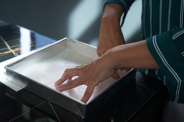 Photo close-up of woman working on table